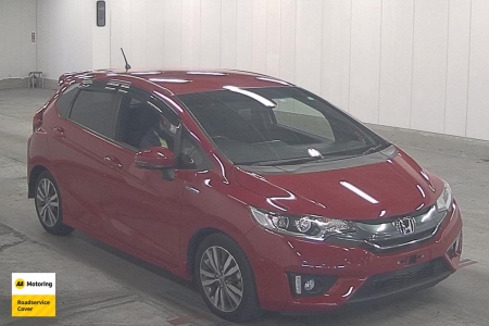 Image of a Red used Honda Fit Hybrid stock #33108 2014 stock number 33108