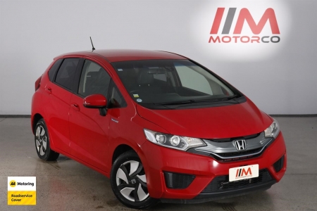 Image of a Red used Honda Fit Hybrid stock #32315 2014 stock number 32315