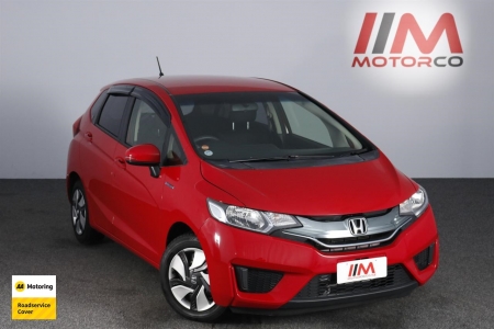 Image of a Red used Honda Fit Hybrid stock #31739 2013 stock number 31739