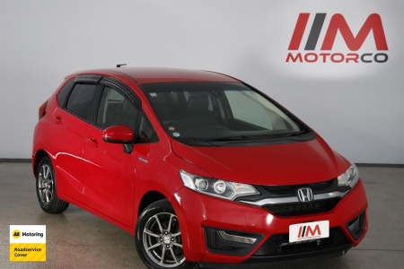 Image of a Red used Honda Fit Hybrid stock #32568 2014 stock number 32568