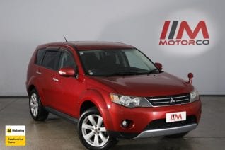Image of a Red used Mitsubishi Outlander stock #32696 2009 stock number 32696