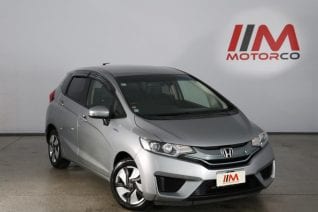 Image of a Grey used Honda Fit Hybrid stock #32570 2014 stock number 32570