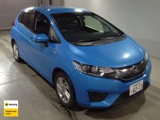 Image of a Blue used Honda Fit Hybrid stock #32925 2014 stock number 32925