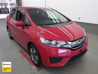 Image of a Red used Honda Fit Hybrid stock #32944 2014 stock number 32944