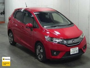 Image of a Red used Honda Fit Hybrid stock #33148 2014 stock number 33148